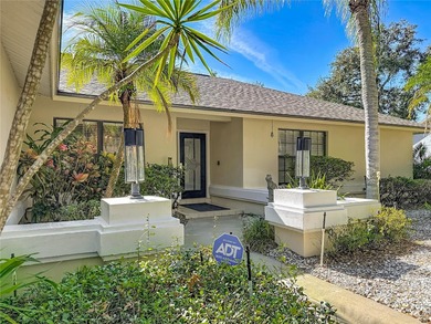 This four bedroom, 3 and a half bathroom pool home is nestled in on Tampa Palms Golf and Country Club in Florida - for sale on GolfHomes.com, golf home, golf lot