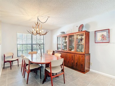 This four bedroom, 3 and a half bathroom pool home is nestled in on Tampa Palms Golf and Country Club in Florida - for sale on GolfHomes.com, golf home, golf lot