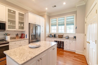 Welcome to this stunning lakefront home located in the highly on The Reserve Golf Club at Pawleys Island in South Carolina - for sale on GolfHomes.com, golf home, golf lot