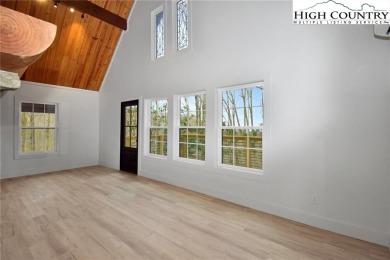 TOTAL RENOVATION A-FRAME ON BEECH MOUNTAIN. This cute 3 bedroom on Beech Mountain Club in North Carolina - for sale on GolfHomes.com, golf home, golf lot