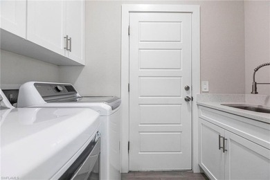 Rare opportunity in Bonita Springs: a nearly new 2023-built on Raptor Bay Golf Club in Florida - for sale on GolfHomes.com, golf home, golf lot