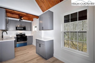 TOTAL RENOVATION A-FRAME ON BEECH MOUNTAIN. This cute 3 bedroom on Beech Mountain Club in North Carolina - for sale on GolfHomes.com, golf home, golf lot
