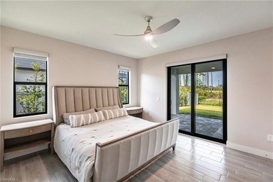 Rare opportunity in Bonita Springs: a nearly new 2023-built on Raptor Bay Golf Club in Florida - for sale on GolfHomes.com, golf home, golf lot