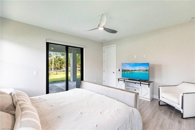 Rare opportunity in Bonita Springs: a nearly new 2023-built on Raptor Bay Golf Club in Florida - for sale on GolfHomes.com, golf home, golf lot