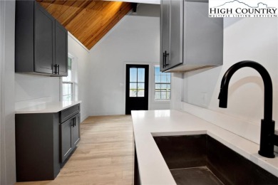 TOTAL RENOVATION A-FRAME ON BEECH MOUNTAIN. This cute 3 bedroom on Beech Mountain Club in North Carolina - for sale on GolfHomes.com, golf home, golf lot