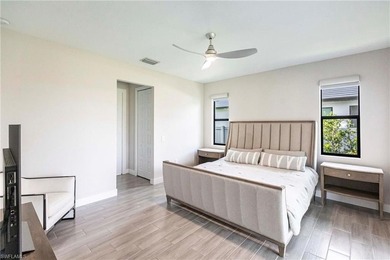 Rare opportunity in Bonita Springs: a nearly new 2023-built on Raptor Bay Golf Club in Florida - for sale on GolfHomes.com, golf home, golf lot