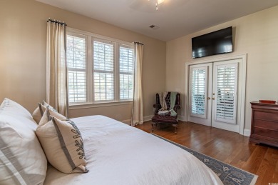 Welcome to this stunning lakefront home located in the highly on The Reserve Golf Club at Pawleys Island in South Carolina - for sale on GolfHomes.com, golf home, golf lot