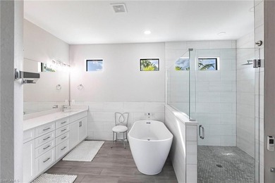 Rare opportunity in Bonita Springs: a nearly new 2023-built on Raptor Bay Golf Club in Florida - for sale on GolfHomes.com, golf home, golf lot