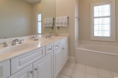 Welcome to this stunning lakefront home located in the highly on The Reserve Golf Club at Pawleys Island in South Carolina - for sale on GolfHomes.com, golf home, golf lot