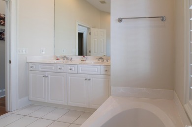 Welcome to this stunning lakefront home located in the highly on The Reserve Golf Club at Pawleys Island in South Carolina - for sale on GolfHomes.com, golf home, golf lot
