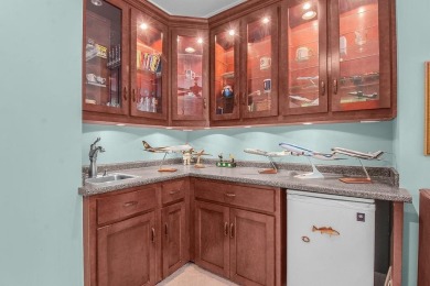 Deep water estate within the gates of a small private community on Sapelo Hammock Golf Club in Georgia - for sale on GolfHomes.com, golf home, golf lot