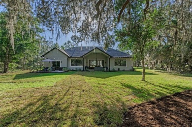 Gorgeous, custom home located in the exclusive gated community on Southern Hills Plantation Club in Florida - for sale on GolfHomes.com, golf home, golf lot