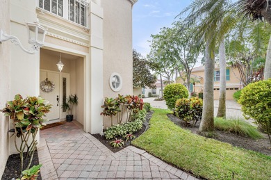 This is an elegantly renovated residence tucked within one of on PGA National Golf Club in Florida - for sale on GolfHomes.com, golf home, golf lot