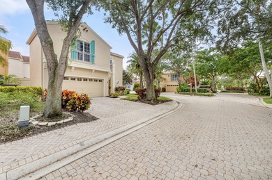 This is an elegantly renovated residence tucked within one of on PGA National Golf Club in Florida - for sale on GolfHomes.com, golf home, golf lot