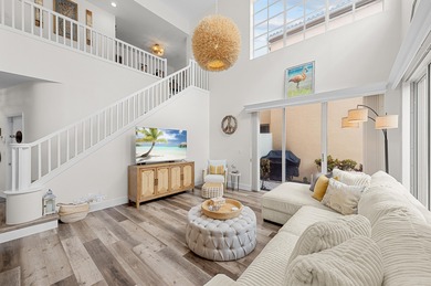 This is an elegantly renovated residence tucked within one of on PGA National Golf Club in Florida - for sale on GolfHomes.com, golf home, golf lot