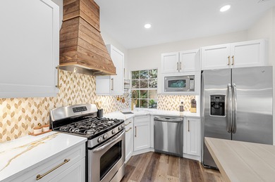 This is an elegantly renovated residence tucked within one of on PGA National Golf Club in Florida - for sale on GolfHomes.com, golf home, golf lot