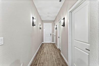 Gorgeous 4-bedroom, 3-bath residence built in 2020, set within on Heritage Ridge Golf Club in Florida - for sale on GolfHomes.com, golf home, golf lot