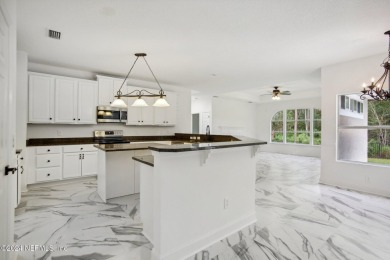 Stunning Remodeled home in highly sought after Cimarrone Golf on Cimarrone Golf and Country Club in Florida - for sale on GolfHomes.com, golf home, golf lot