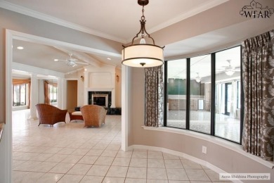 Discover this exquisite 4-bedroom, 3-bath home with a on The Champions Course At Weeks Park in Texas - for sale on GolfHomes.com, golf home, golf lot