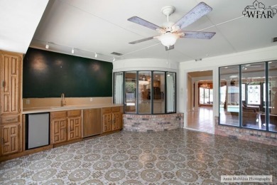 Discover this exquisite 4-bedroom, 3-bath home with a on The Champions Course At Weeks Park in Texas - for sale on GolfHomes.com, golf home, golf lot