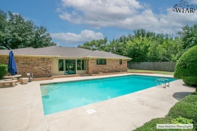 Discover this exquisite 4-bedroom, 3-bath home with a on The Champions Course At Weeks Park in Texas - for sale on GolfHomes.com, golf home, golf lot