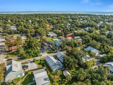 This pristine cottage has great curb appeal with its beckoning on The Bridges Golf Club At Hollywood Casino in Mississippi - for sale on GolfHomes.com, golf home, golf lot