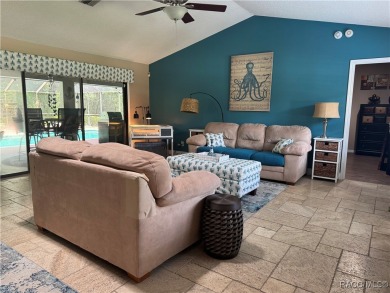 Welcome to this beautiful 3-bedroom, 2-bath pool home nestled in on Pine Ridge Community Golf and Country Club in Florida - for sale on GolfHomes.com, golf home, golf lot