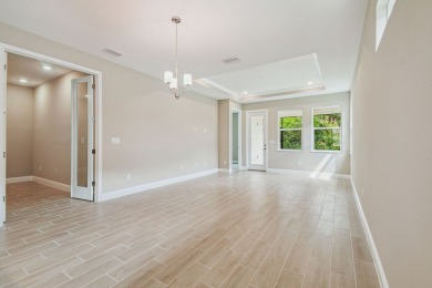 Welcome to the epitome of luxury living at our brand-new paired on The Golf Club of Cypress Creek in Florida - for sale on GolfHomes.com, golf home, golf lot