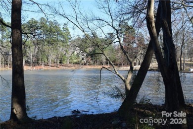 Enjoy lake living in the prestigious and private Old North State on Old North State Club in North Carolina - for sale on GolfHomes.com, golf home, golf lot