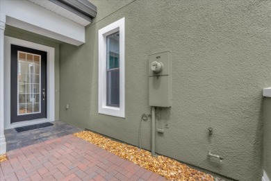 These luxury townhomes feature solid concrete block construction on Tuscawilla Country Club in Florida - for sale on GolfHomes.com, golf home, golf lot