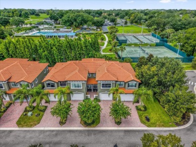 These luxury townhomes feature solid concrete block construction on Tuscawilla Country Club in Florida - for sale on GolfHomes.com, golf home, golf lot