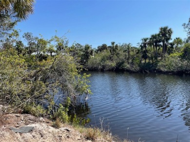 Waterfront Lot. Build your new Dreamhouse here in Port Charlotte on Riverwood Golf Club in Florida - for sale on GolfHomes.com, golf home, golf lot