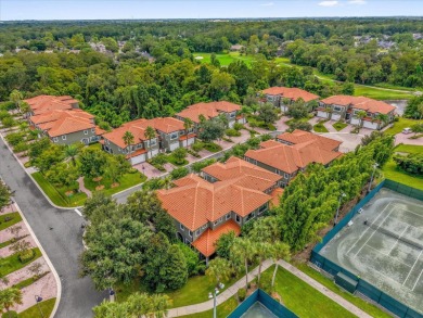 These luxury townhomes feature solid concrete block construction on Tuscawilla Country Club in Florida - for sale on GolfHomes.com, golf home, golf lot