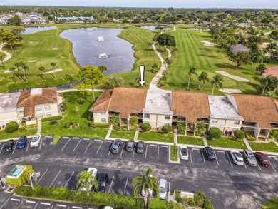 Delightful Eastpointe condo with gorgeous lake and golf views on Old Marsh Golf Club in Florida - for sale on GolfHomes.com, golf home, golf lot