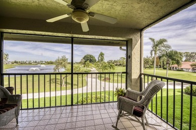 Delightful Eastpointe condo with gorgeous lake and golf views on Old Marsh Golf Club in Florida - for sale on GolfHomes.com, golf home, golf lot