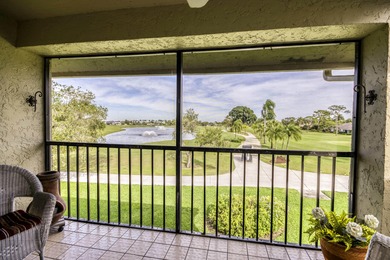 Delightful Eastpointe condo with gorgeous lake and golf views on Old Marsh Golf Club in Florida - for sale on GolfHomes.com, golf home, golf lot