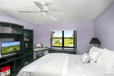 Delightful Eastpointe condo with gorgeous lake and golf views on Old Marsh Golf Club in Florida - for sale on GolfHomes.com, golf home, golf lot