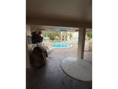 Cozy 2/2 Condo with relaxing view of the garden, the pool and a on Inverrary Country Club in Florida - for sale on GolfHomes.com, golf home, golf lot