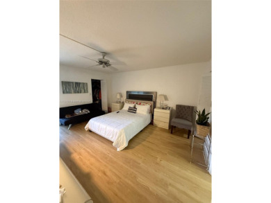Cozy 2/2 Condo with relaxing view of the garden, the pool and a on Inverrary Country Club in Florida - for sale on GolfHomes.com, golf home, golf lot