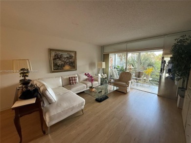 Cozy 2/2 Condo with relaxing view of the garden, the pool and a on Inverrary Country Club in Florida - for sale on GolfHomes.com, golf home, golf lot