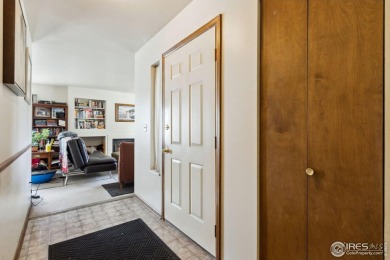 Enjoy easy main-floor living in this 2-bedroom, 1-bath end-unit on Collindale Golf Course in Colorado - for sale on GolfHomes.com, golf home, golf lot