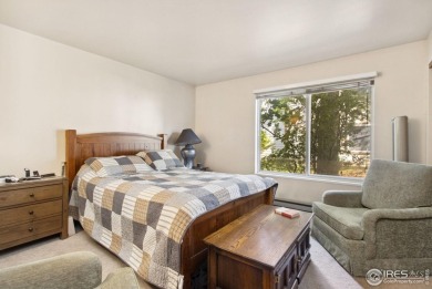 Enjoy easy main-floor living in this 2-bedroom, 1-bath end-unit on Collindale Golf Course in Colorado - for sale on GolfHomes.com, golf home, golf lot