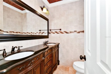 Welcome to this beautifully maintained 3-bedroom, 2.5-bath home on Arnold Palmers Bay Hill Club and Lodge  in Florida - for sale on GolfHomes.com, golf home, golf lot