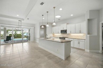 Welcome to this stunning, Paytas built home, perfectly on Venetian Bay Golf Course in Florida - for sale on GolfHomes.com, golf home, golf lot