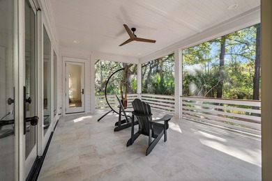 Set along a quiet lagoon with mature oaks, this newly on The Seabrook Island Club in South Carolina - for sale on GolfHomes.com, golf home, golf lot