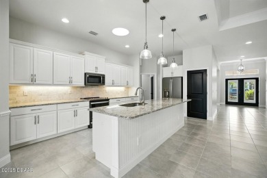 Welcome to this stunning, Paytas built home, perfectly on Venetian Bay Golf Course in Florida - for sale on GolfHomes.com, golf home, golf lot
