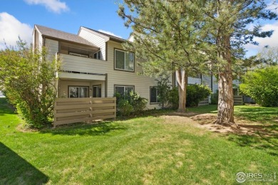 Enjoy easy main-floor living in this 2-bedroom, 1-bath end-unit on Collindale Golf Course in Colorado - for sale on GolfHomes.com, golf home, golf lot