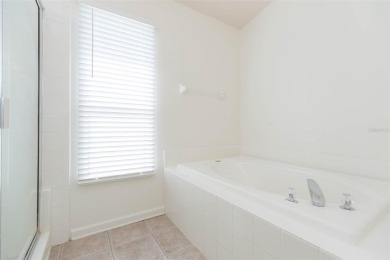 One or more photo(s) has been virtually staged. Tucked away on a on Lexington Oaks Golf Club in Florida - for sale on GolfHomes.com, golf home, golf lot