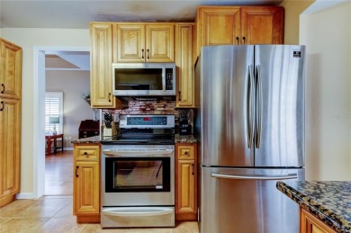 Welcome home to this beautifully maintained 3-bedroom, 2.5-bath on Countryway Golf Course in Florida - for sale on GolfHomes.com, golf home, golf lot