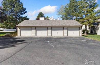 Enjoy easy main-floor living in this 2-bedroom, 1-bath end-unit on Collindale Golf Course in Colorado - for sale on GolfHomes.com, golf home, golf lot